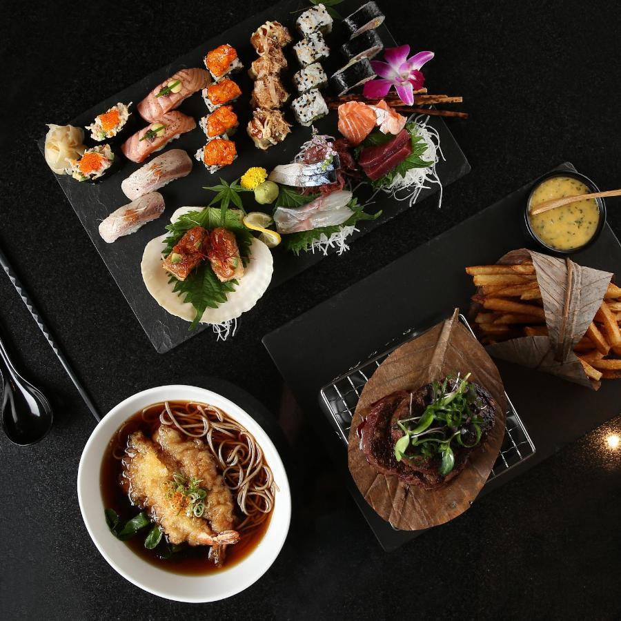 Mondrian Doha Hotel Exterior photo A selection of dishes at the restaurant