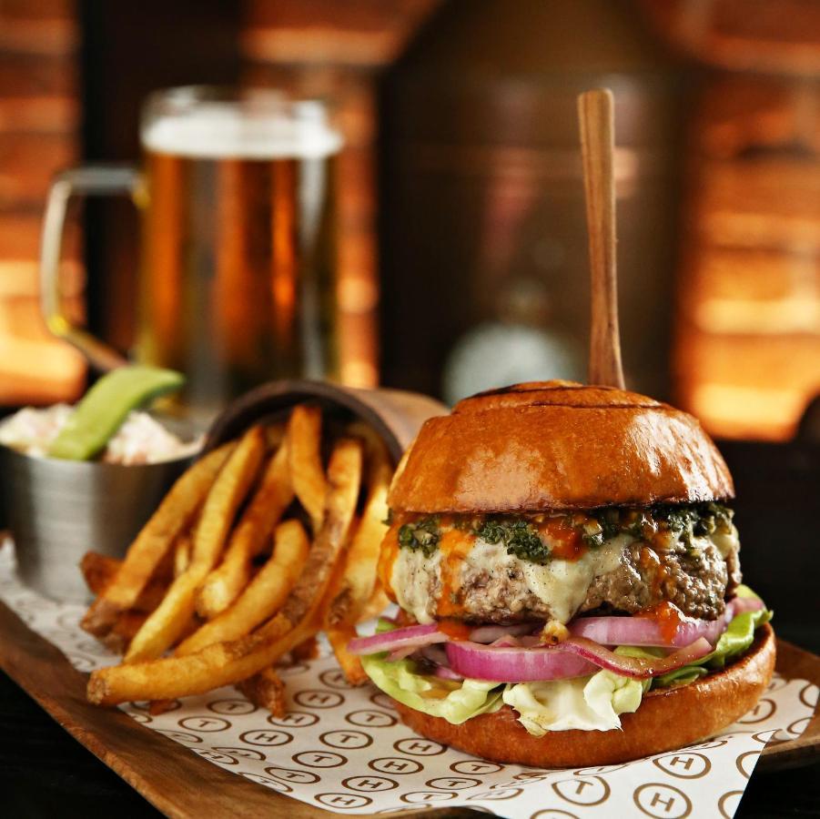 Mondrian Doha Hotel Exterior photo A burger with chips