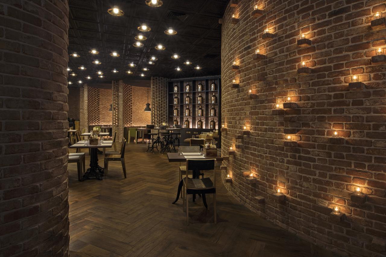 Mondrian Doha Hotel Exterior photo Interior of the restaurant